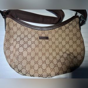 *SOLD* Authentic Gucci monogram canvas moon shaped crossbody bag.